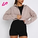 Upgrade your casual style with our cropped hoodie. Perfect for layering or on its own, this hoodie features a trendy cropped design and comfortable fit, making it the perfect addition to any wardrobe. Shop now and elevate your everyday look.